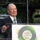 Bloomberg poses with Oscar the Grouch during a summit in New York City on Wednesday.